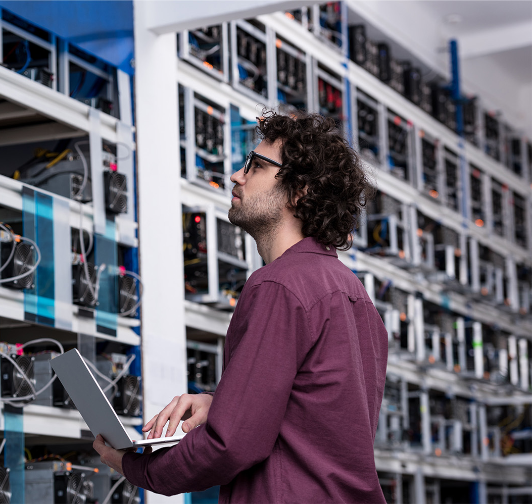 A man looking at servers